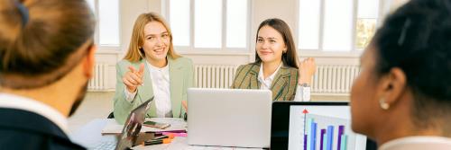 ladies talking in a business meeting